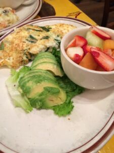 Omelette with avocado and fruit at The Grey Dog