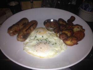 Eggs, sausage, potatoes at Almond
