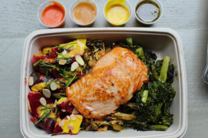 Salmon Plate with Salsa Verde, Miso Honey, Lemon Tahini and Garlic Chili from The Little Beet