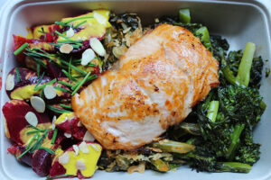 Salmon Plate with Beets, Broccolini and Collard Greens from The Little Beet