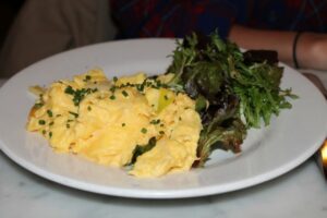 Egg scramble with squash and greens at Hundred Acres