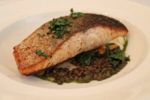 Salmon on parsnip and lentils at the Sea Fire Grill