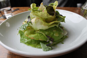 Bibb lettuce with root vegetables and cashew sauce at Grey Lady