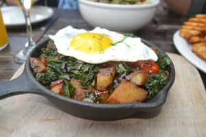 Kale hash with tomatoes and potatoes from Randolph Beer