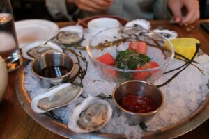 Oysters and Fluke Crudo at The Dutch
