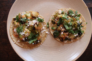 brussels sprouts almond tacos on corn tortillas at Empellon Cocina