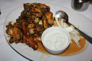 chicken scarpariello wings at Carmine's