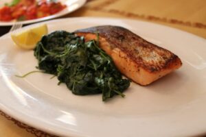 Salmon with sauteed spinach at Angelini Osteria
