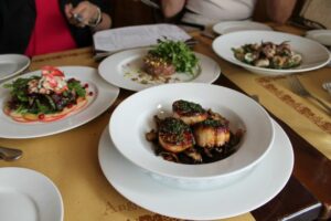 Tuna tartar nobread, lobster salad, scallops, sauteed calamari from Angelini Osteria
