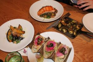 Brussels Sprouts, fish tacos, salmon, acorn squash from The Little Beet Table