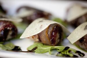 Bacon wrapped dates with goat cheese at The Luggage Room PIzzeria