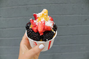 Vegan and gluten free mango fruit serve with berries from Chloe's Soft Serve