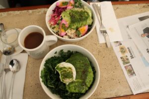 Kale Salad with poached egg and avocado and grains/crudite salad no grains at El Rey