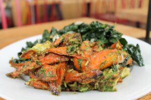 Roasted carrot with avocado and kale salad at Huckleberry