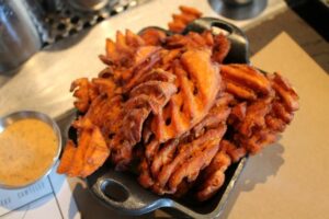 Sweet potato waffle fries at Plan Check Kitchen + Bar