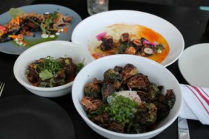 Gluten free brussels sprouts, octopus, meatballs, carrots at Superba Snack Bar
