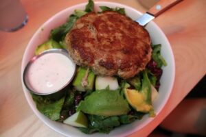 Turkey Burger on salad at Black Tap
