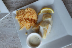 Cod with rice pilaf at Louie's Oyster Bar & Grille