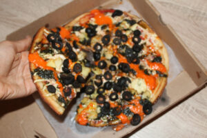 Gluten free pizza with black olives at Two Boots