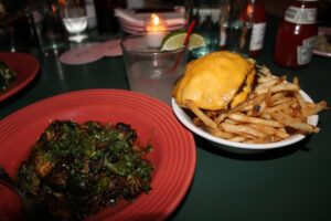 The Happiest Burger with nobread and french fries and brussels sprouts at The Happiest Hour