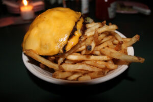 The Happiest Burger with nobread and french fries at The Happiest Hour