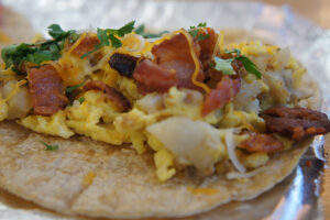 The Basic Breakfast Taco on a corn tortilla from District Taco