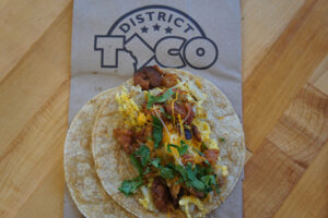 The Basic Breakfast Taco on a corn tortilla from District Taco
