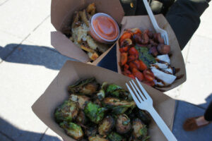 The LDV swizzle with no bun, cherry tomatoes, and mozzarella, brussels sprouts, truffle fries from Swizzler Food Truck