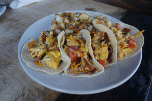The Allman's Breakfast Burrito with corn tortillas at Fratelli Cafe