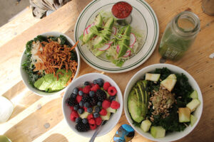 The best Kale Salad, avocado tempeh tacos, fruit salad at The Butcher's Daughter