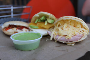 Mango and avocado, roasted red pepper and mozzarella, and ham and cheese arepas at Bolivar Cafe