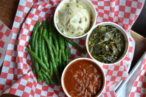 Mashed Potatoes, Spiced String Beans, BBQ Baked Beans, and Collard Greens at Brother Jimmy's
