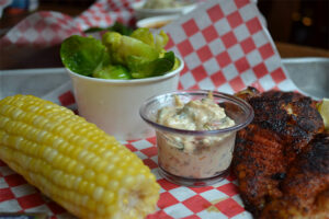 Blackened Catfish with Tartar Sauce, Corn, and Steamed Brussel Sprouts at Brother Jimmy's