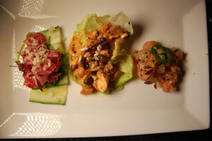 Tuna and Hamachi Poke, Octopus Poke and Spicy Char Poke at BLT Prime