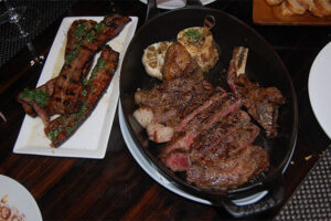 Grilled Double Cut Smoked Bacon and NY Strip at BLT Prime
