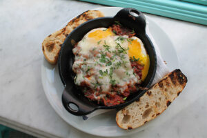 Gluten free bread and baked eggs at Pizza Beach