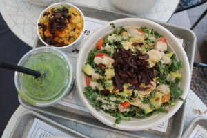 Kale Caesar salad and no croutons with gluten free sweet potato man n cheese at By Chloe