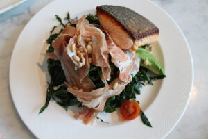 Kale Salad with Salmon and prosciutto at Herringbone