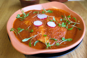 Mexico City-style chicken enchiladas at Wahaca in London, UK