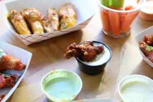 Assortment of Wings and Sauces from International Wings Factory