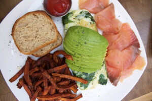 Egg white omelette with spinach and avocado, sweet potato fries, and gluten free bread at Babette's Newport Beach
