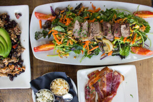 Healthy Steak Salad, Bacon, and Chicken & Avo Burrito Bowl at The Rockefeller in Manhattan Beach