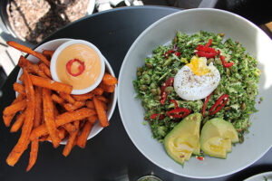 Greens salad with Poached Egg and sweet potato fries at Banter